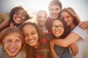 Financially savvy teens smiling for photo