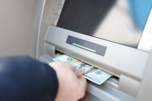 bank jugging - drawing money from an atm